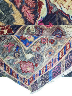 A handwoven Afghan Chobi rug featuring a traditional Bidjar pattern in vibrant, multi-colored wool.
