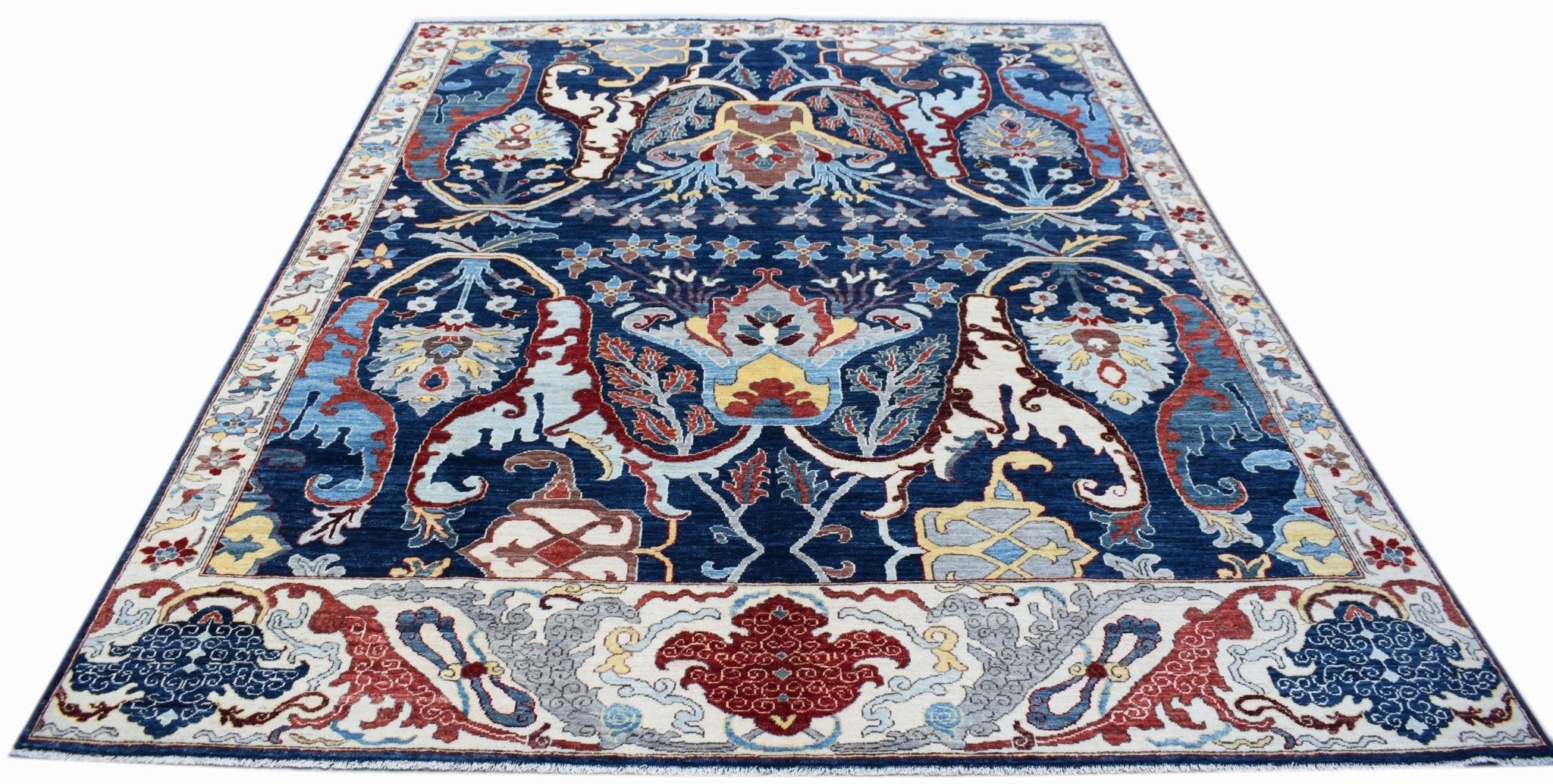 A rectangular Afghan Chobi rug featuring a traditional floral pattern in blue, red, and cream.