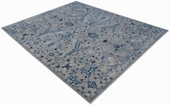 An Afghan Chobi rug featuring a traditional Bidjar pattern in shades of blue and grey.
