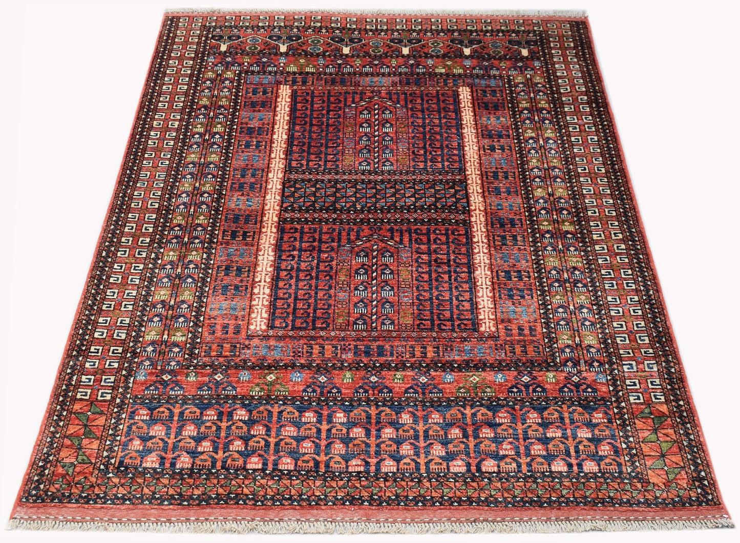 A handmade Afghan Chobi rug featuring a traditional red and blue geometric Engsi design.