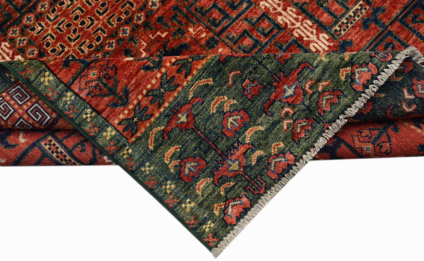 A handwoven Afghan Chobi rug featuring a geometric pattern in red, green, and blue tones.