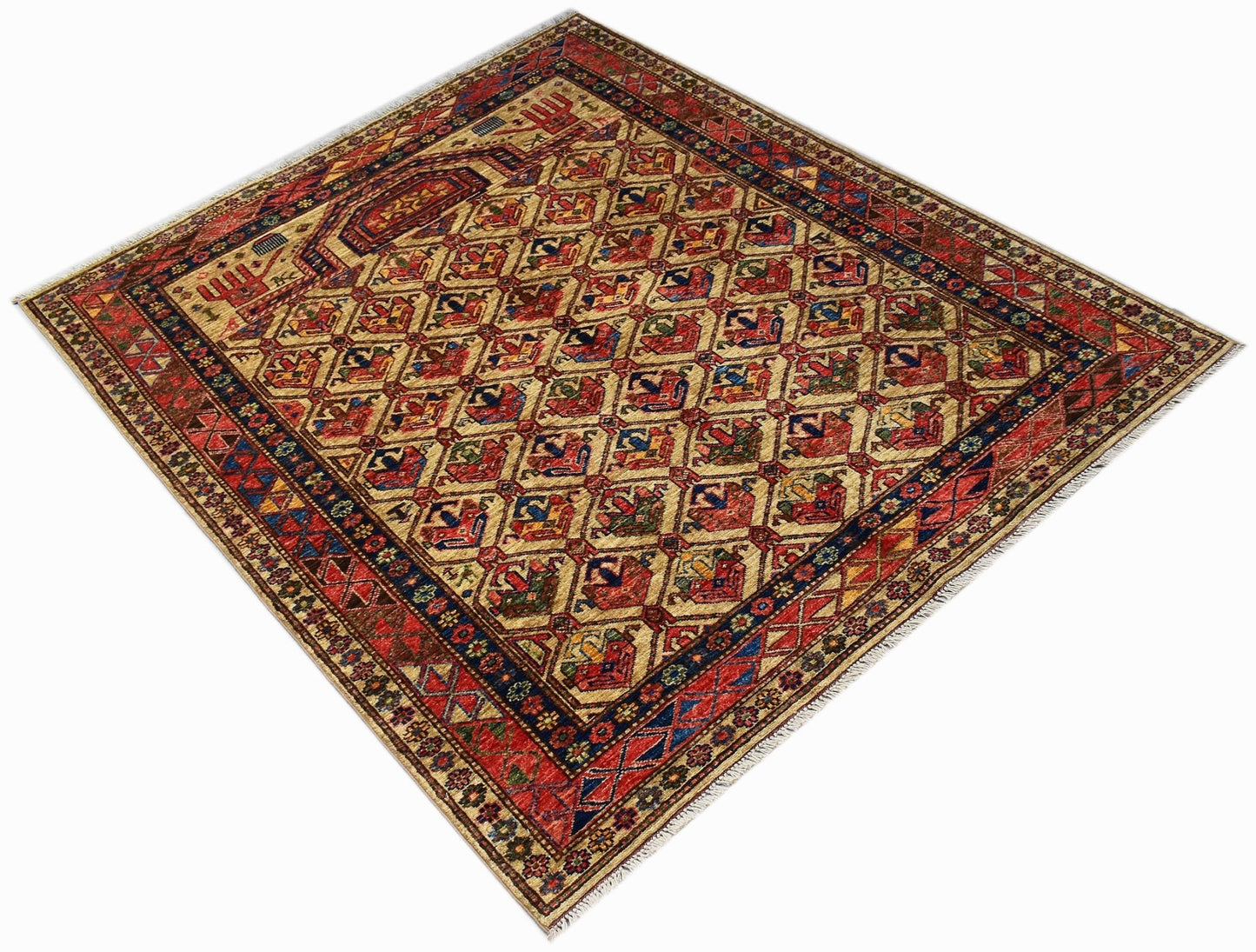 A handmade Afghan Chobi rug featuring a traditional geometric Engsi pattern in earthy tones.