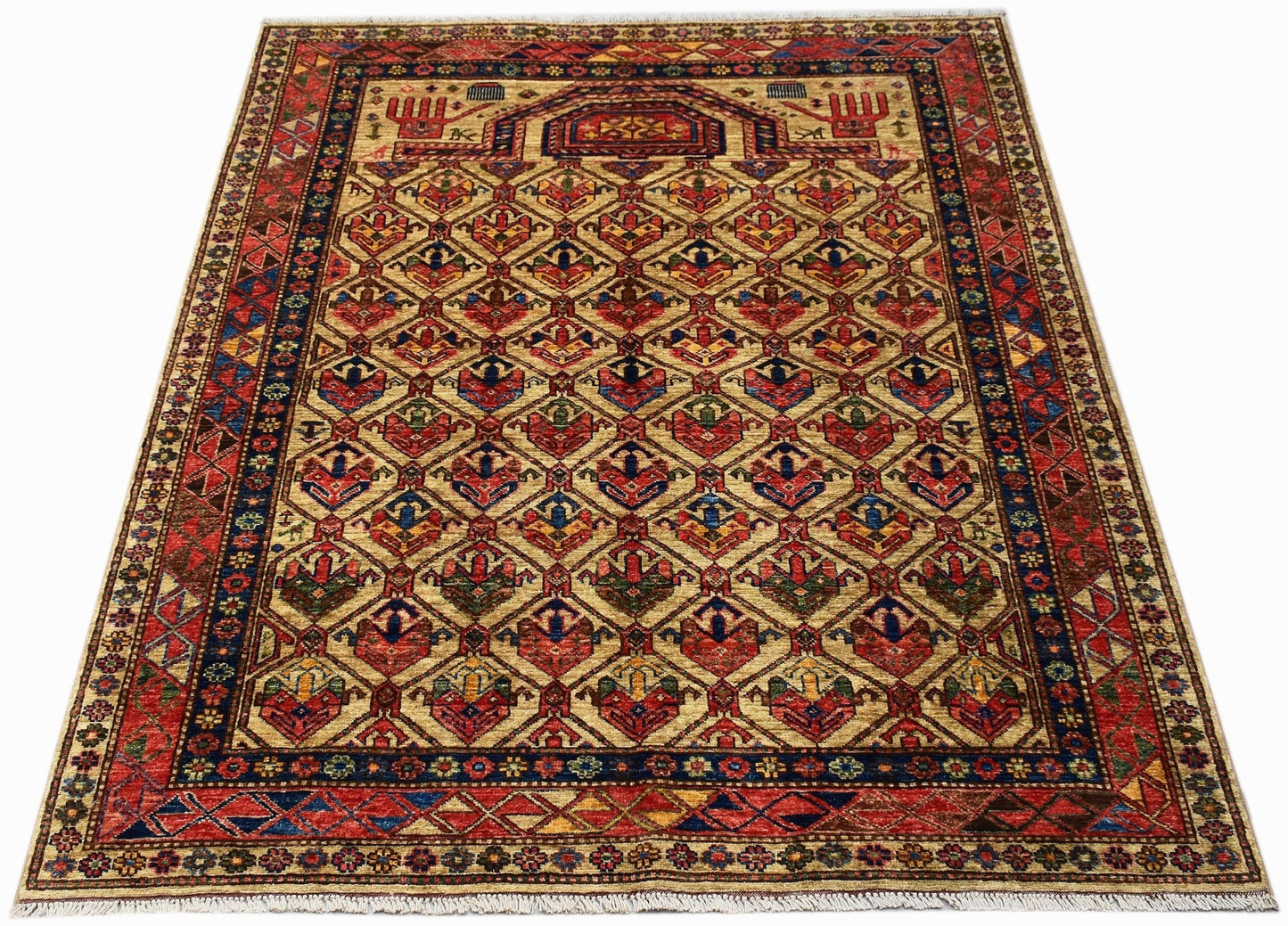 Handwoven Afghan Chobi rug featuring a traditional geometric Engsi pattern in earthy tones.