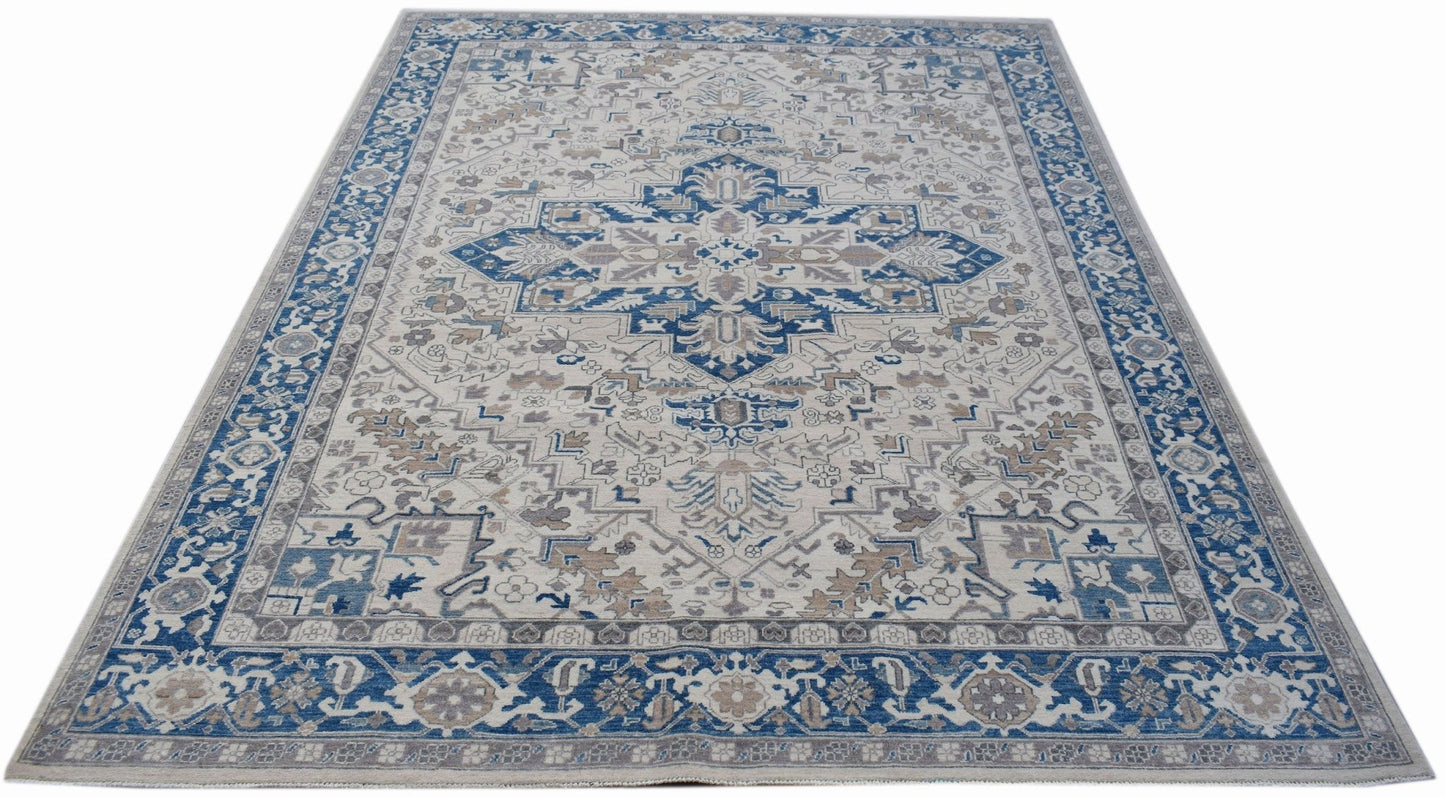 A rectangular Afghan Chobi rug featuring a traditional Heriz pattern in blue, beige, and grey.