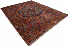 An Afghan Chobi rug featuring a large geometric medallion in shades of red, blue, and brown.