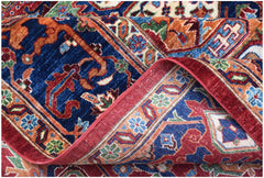A handwoven Afghan Chobi rug featuring a traditional Heriz pattern in blue, red, and orange tones.