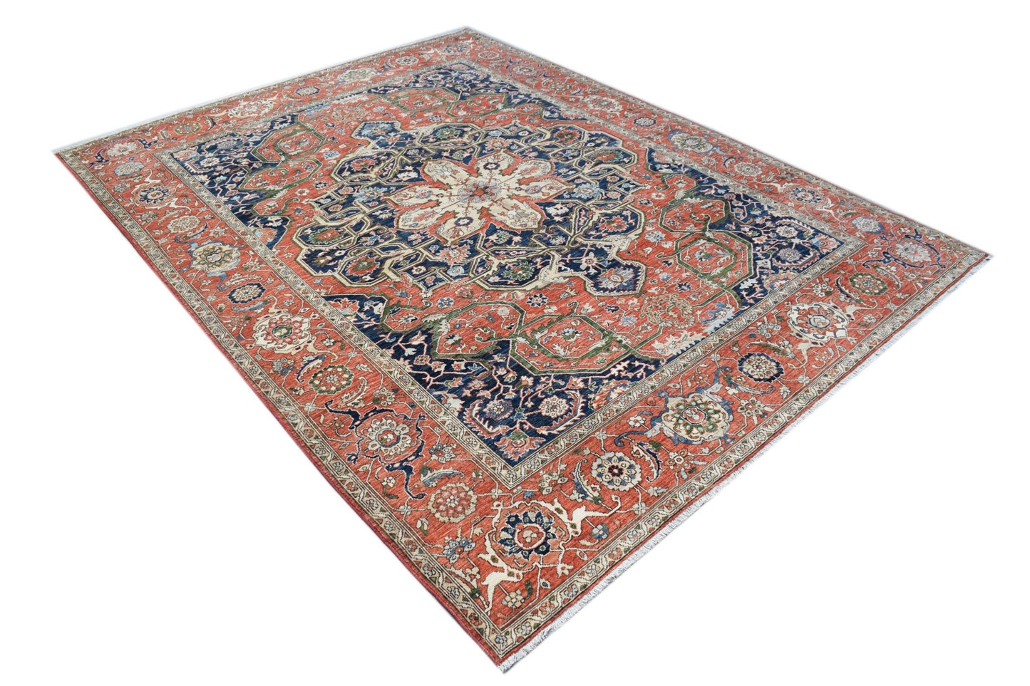 A handmade Afghan Chobi rug featuring a traditional Heriz pattern in red, blue, and cream tones.