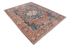 A handmade Afghan Chobi rug featuring a traditional Heriz pattern in red, blue, and cream tones.