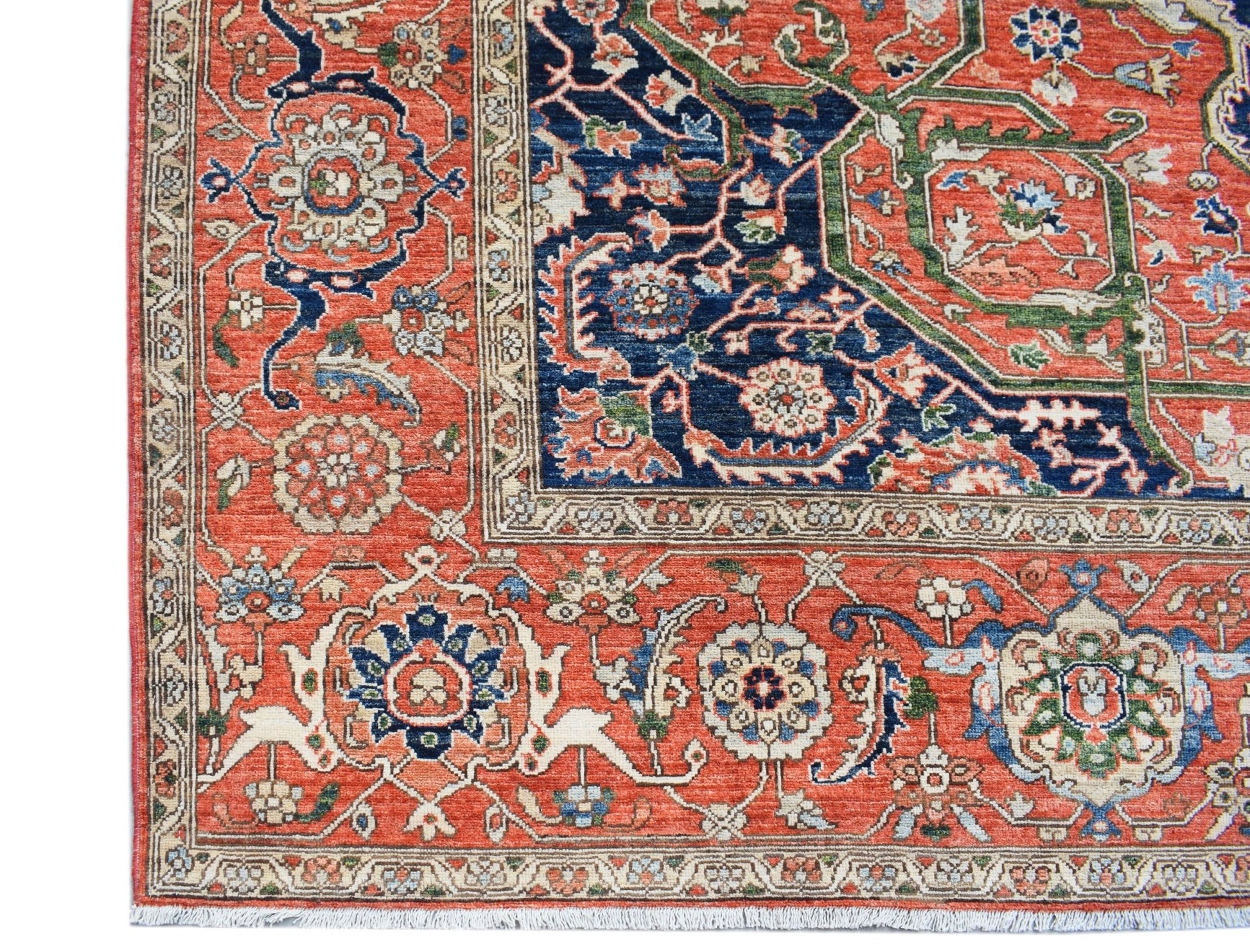 Handwoven Afghan Chobi rug featuring a traditional Heriz pattern in red, blue, and cream tones.