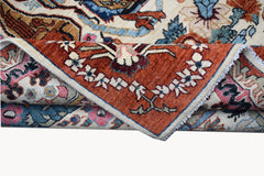 A handwoven Afghan Chobi rug featuring a detailed hunting scene in warm, earthy tones.