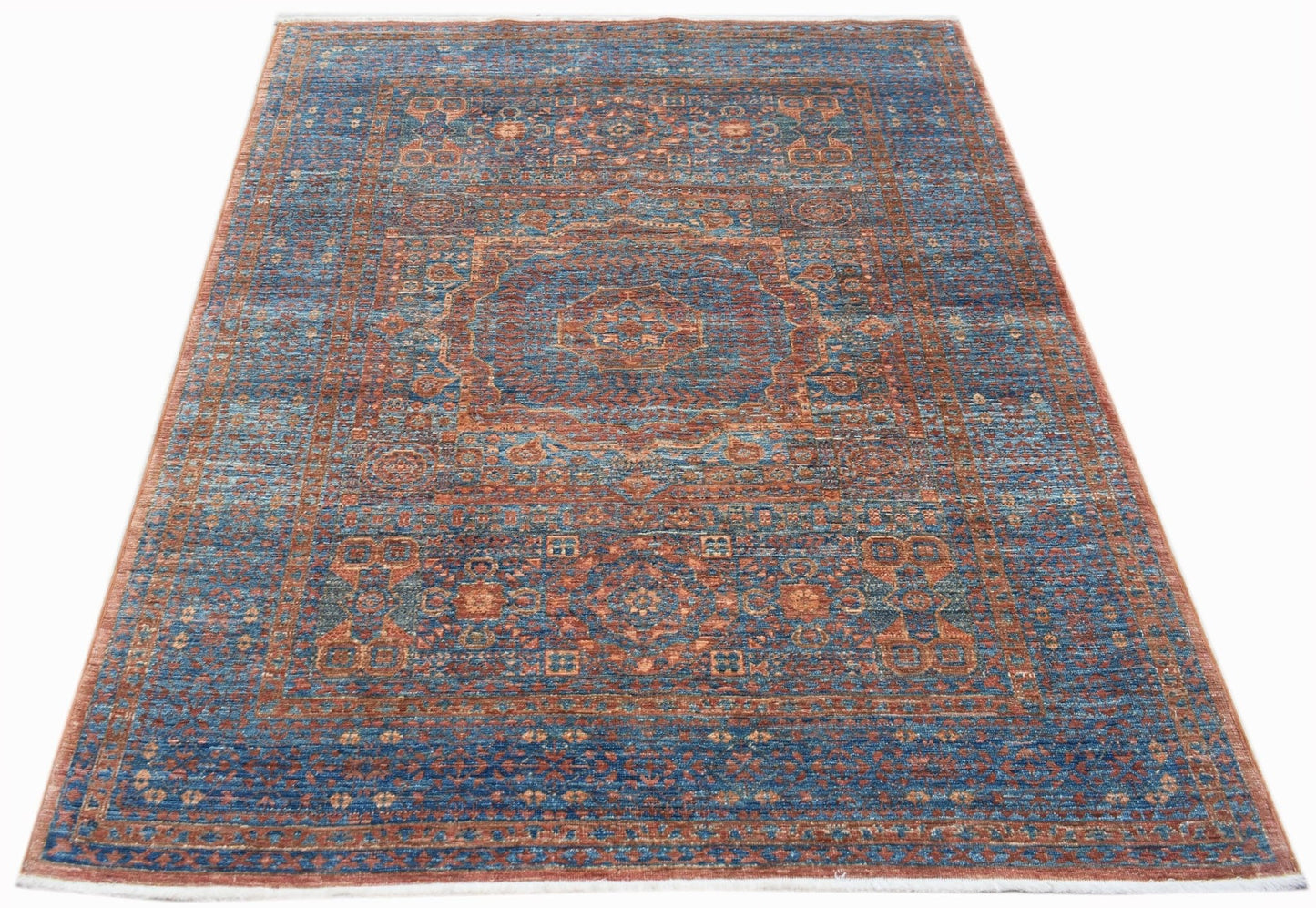 A rectangular Afghan Chobi rug featuring a detailed Mamluk medallion pattern in blue and rust tones.