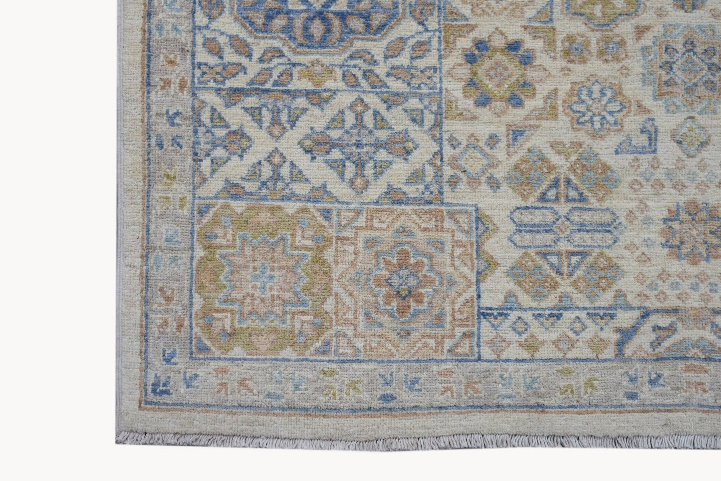 A handmade Afghan Chobi rug featuring a traditional Mamluk geometric pattern in muted earth tones.