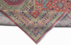 A handmade Afghan Chobi rug featuring a traditional Mamluk pattern in red, blue, and beige tones.
