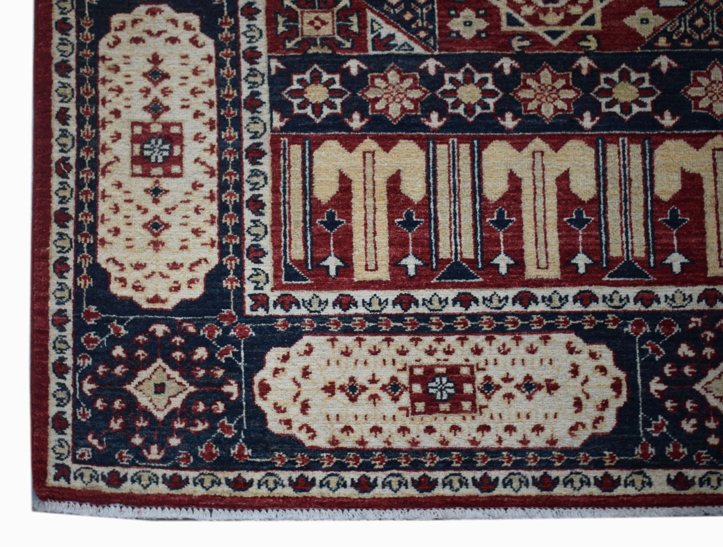 Handwoven Afghan Chobi rug featuring a traditional Mamluk pattern in red, cream, and navy blue.