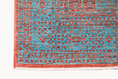 A handmade Afghan Chobi rug featuring a detailed Mamluk pattern in vibrant red and blue tones.