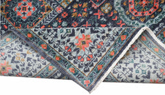 A handmade Afghan Chobi rug with a detailed Mamluk pattern in blue, red, and gold tones.
