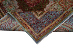 A handmade Afghan Chobi rug featuring a complex Mamluk medallion pattern in red, green, and blue.