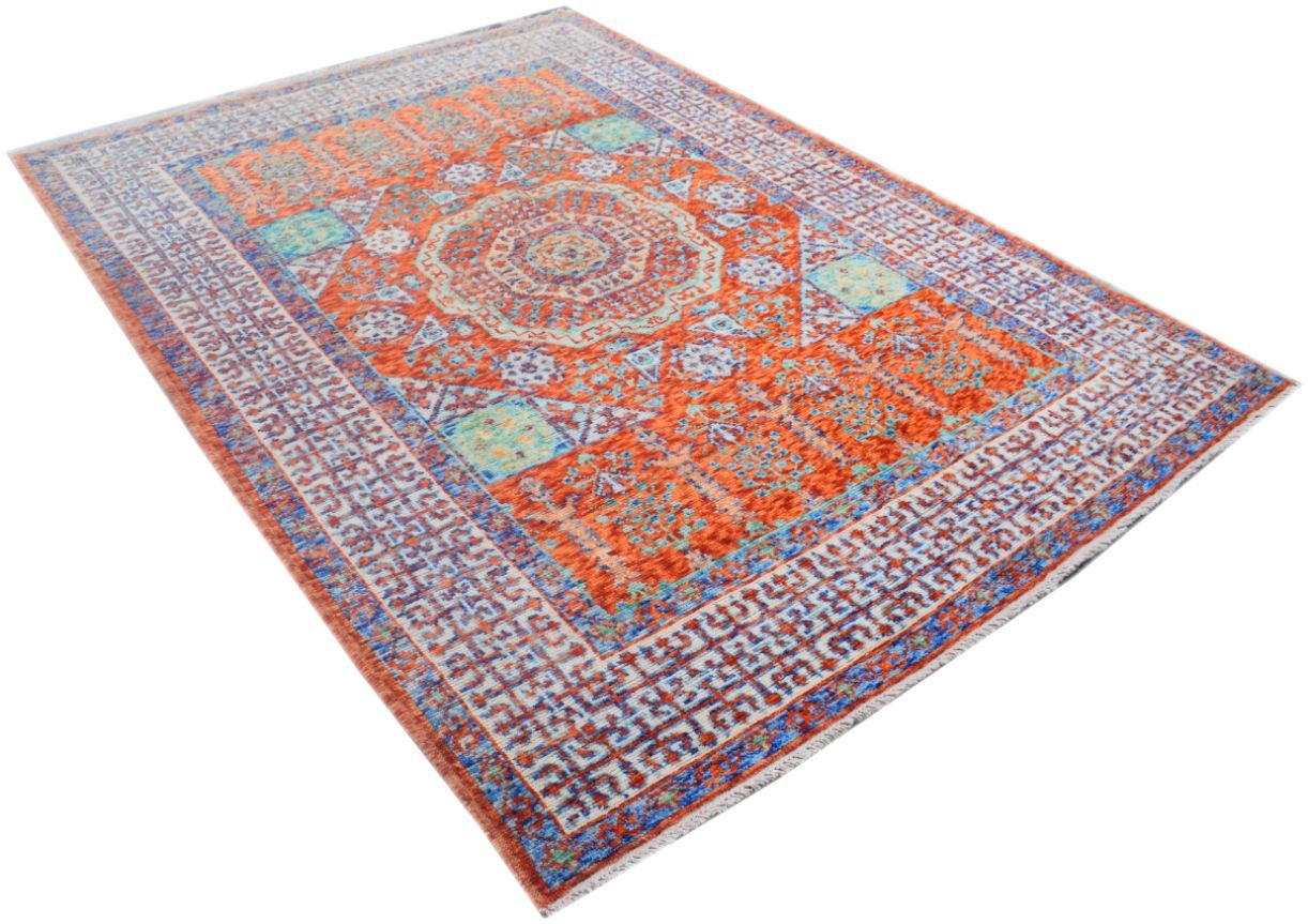An Afghan Chobi rug featuring a Mamluk-inspired geometric pattern in orange and blue tones.