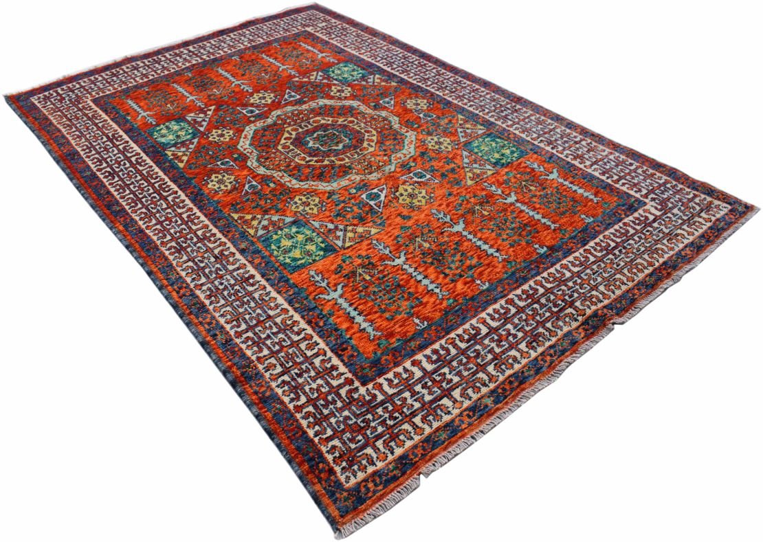 Handmade Afghan Chobi rug featuring a central medallion and geometric patterns in orange and blue.