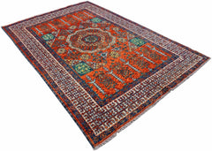 Handmade Afghan Chobi rug featuring a central medallion and geometric patterns in orange and blue.