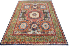 Handwoven Afghan Chobi rug featuring a traditional Mamluk medallion pattern in earthy tones.