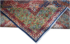 A handwoven Afghan Chobi rug featuring a complex Mamluk pattern in green, red, and blue tones.