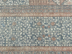 A handmade Afghan Chobi rug featuring a traditional Mamluk pattern in muted blue and tan tones.