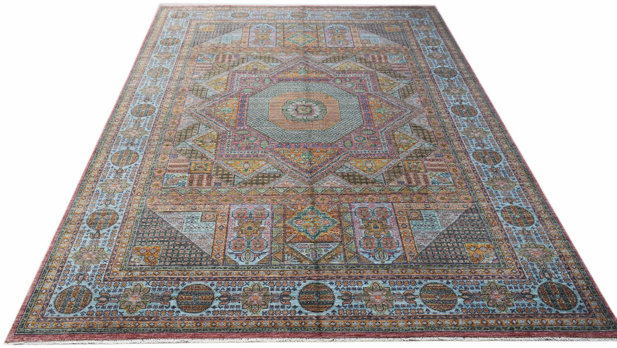 Handwoven Afghan Chobi rug featuring a traditional Mamluk geometric pattern in earthy tones.