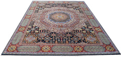 A rectangular Afghan Mamluk rug featuring a complex geometric medallion and intricate floral motifs.