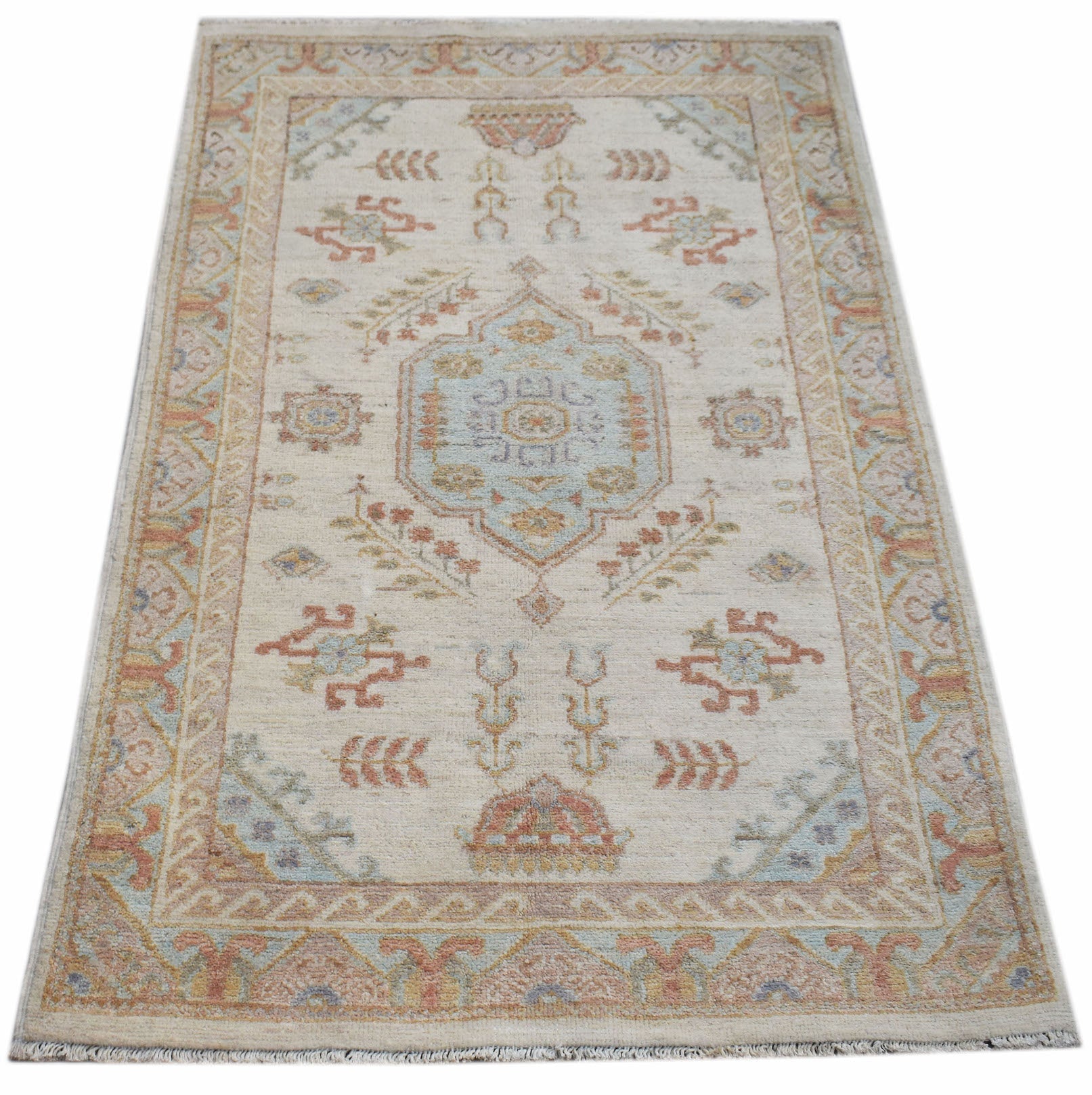 A rectangular Afghan Chobi rug featuring a traditional floral medallion on a cream background.