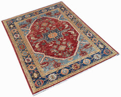 A rectangular Afghan Chobi rug featuring a traditional red and blue floral medallion pattern.