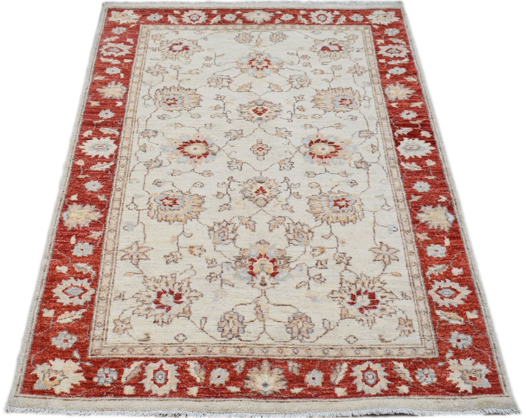 A rectangular Afghan Chobi rug featuring a cream field with floral motifs and a red border.