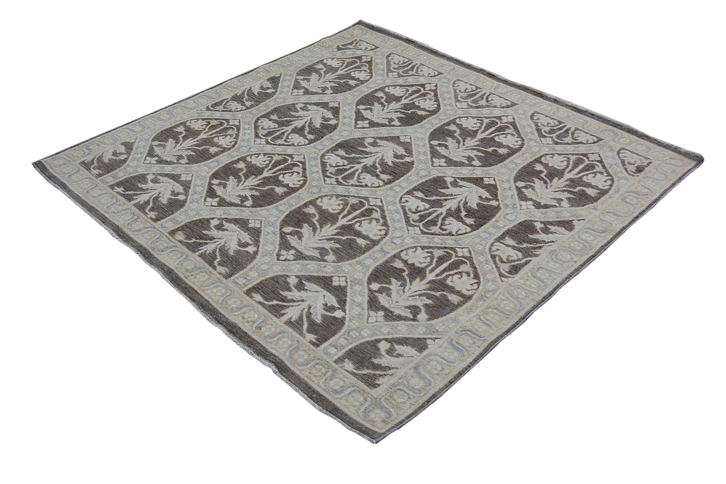 A square Afghan Chobi rug featuring a repeating floral pattern in brown and cream tones.