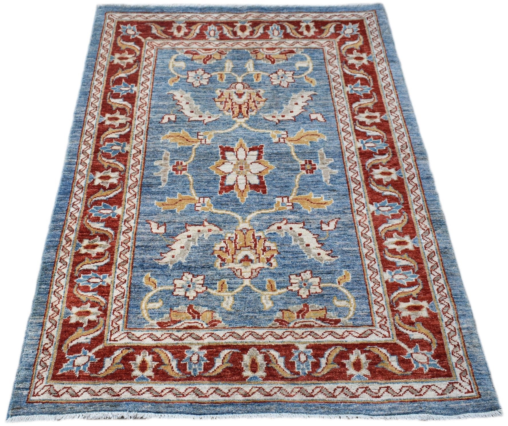 A rectangular Afghan Chobi rug featuring a floral pattern in red, blue, and cream tones.