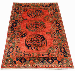 A rectangular Afghan Chobi rug featuring three central medallions on a vibrant red field.