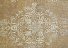 A handmade Afghan Chobi rug featuring a central floral medallion in soft beige and cream tones.