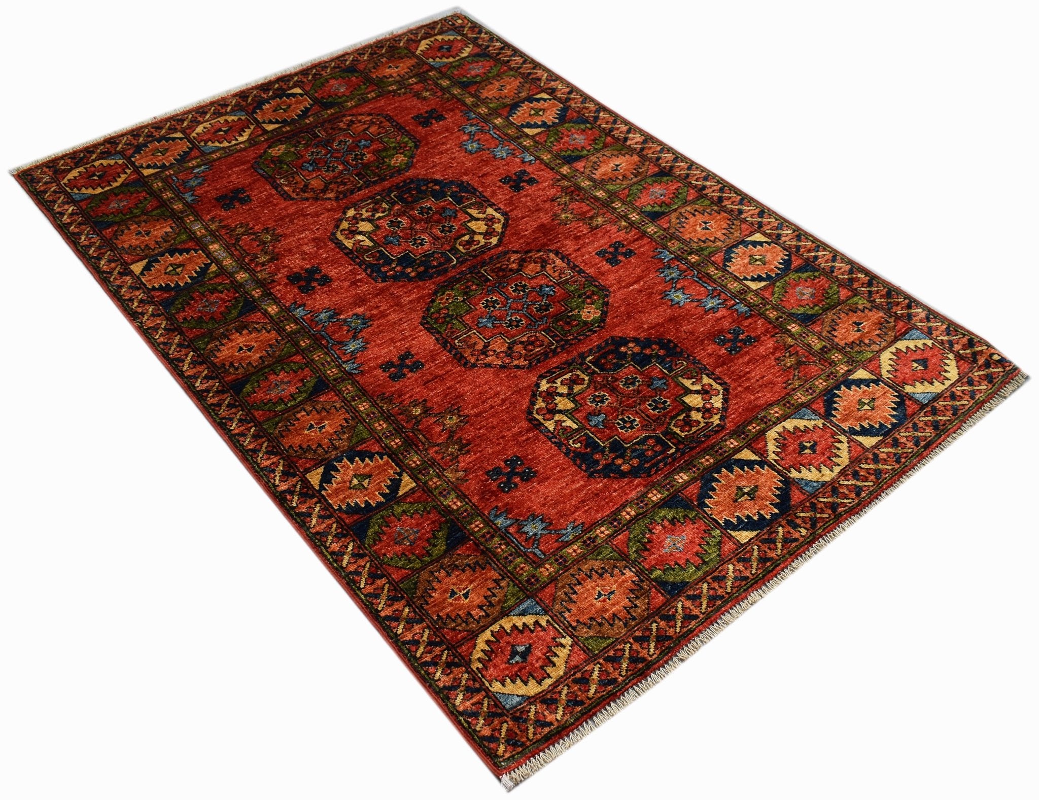 A rectangular Afghan Chobi rug featuring traditional geometric patterns in red and blue tones.