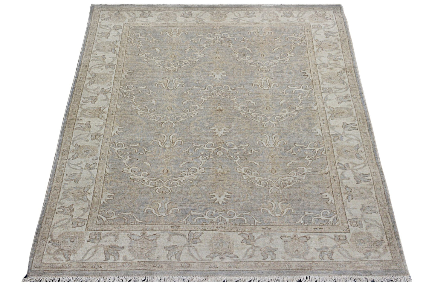 A rectangular Afghan Chobi rug featuring a traditional beige and grey floral pattern.