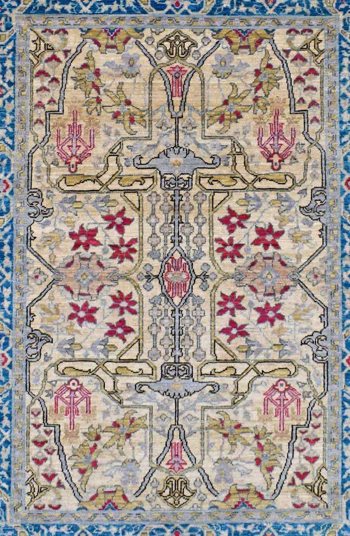 Handwoven Afghan Chobi rug featuring a traditional floral pattern in muted earth tones and blue.