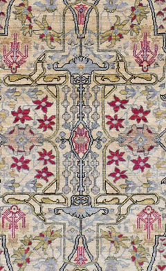Handwoven Afghan Chobi rug featuring a traditional floral pattern in red, blue, and beige tones.
