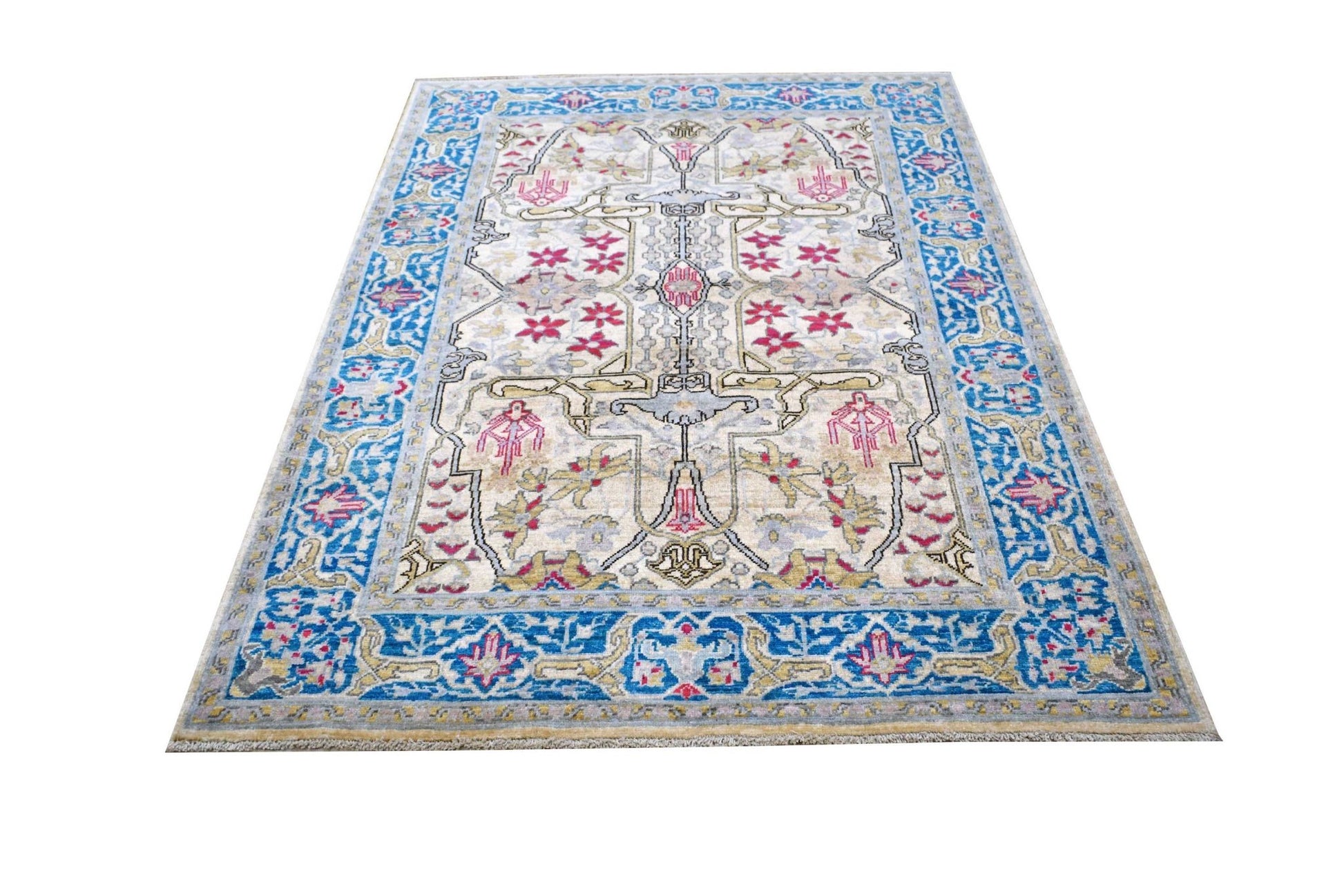 An Afghan Chobi rug featuring a traditional floral pattern in blue, pink, and beige tones.