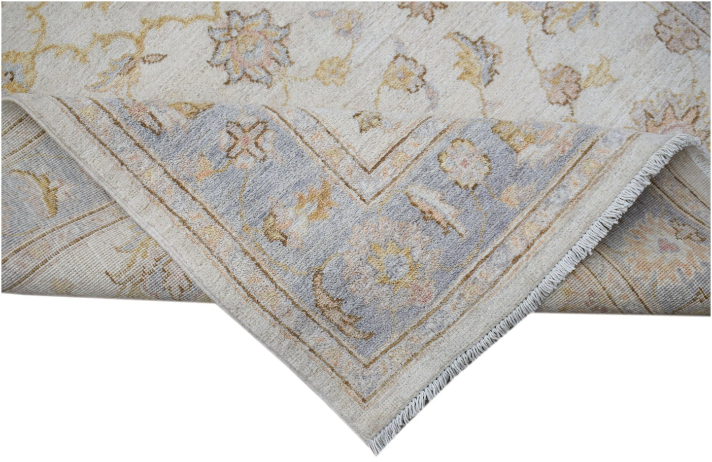 A handwoven Afghan Chobi rug featuring a floral pattern in soft blue and beige tones.