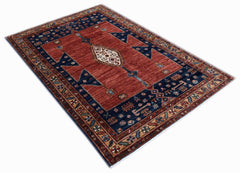 A rectangular Afghan Chobi rug featuring a central medallion on a red field with a blue border.