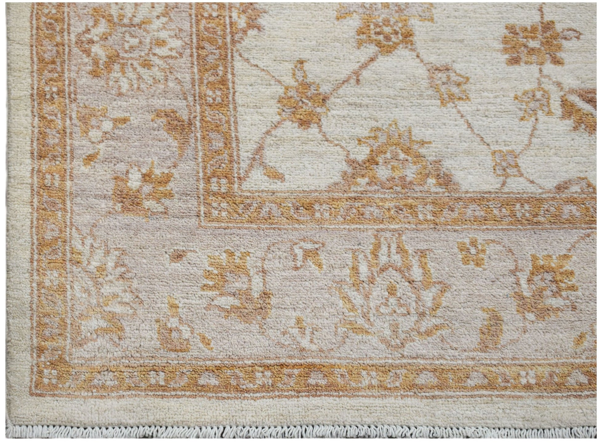 A handmade Afghan Chobi rug featuring a traditional floral pattern in soft beige and brown tones.