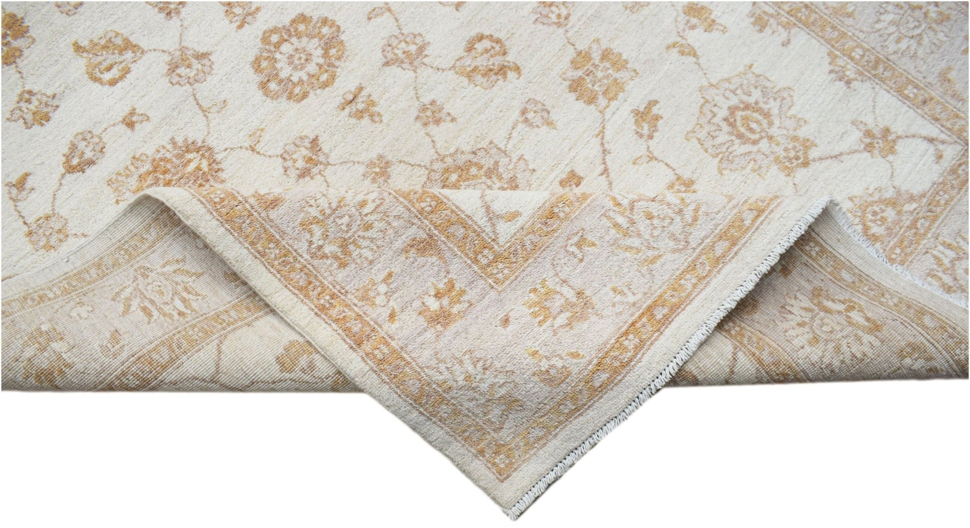 A handwoven Afghan Chobi rug featuring a cream background with soft gold floral patterns.