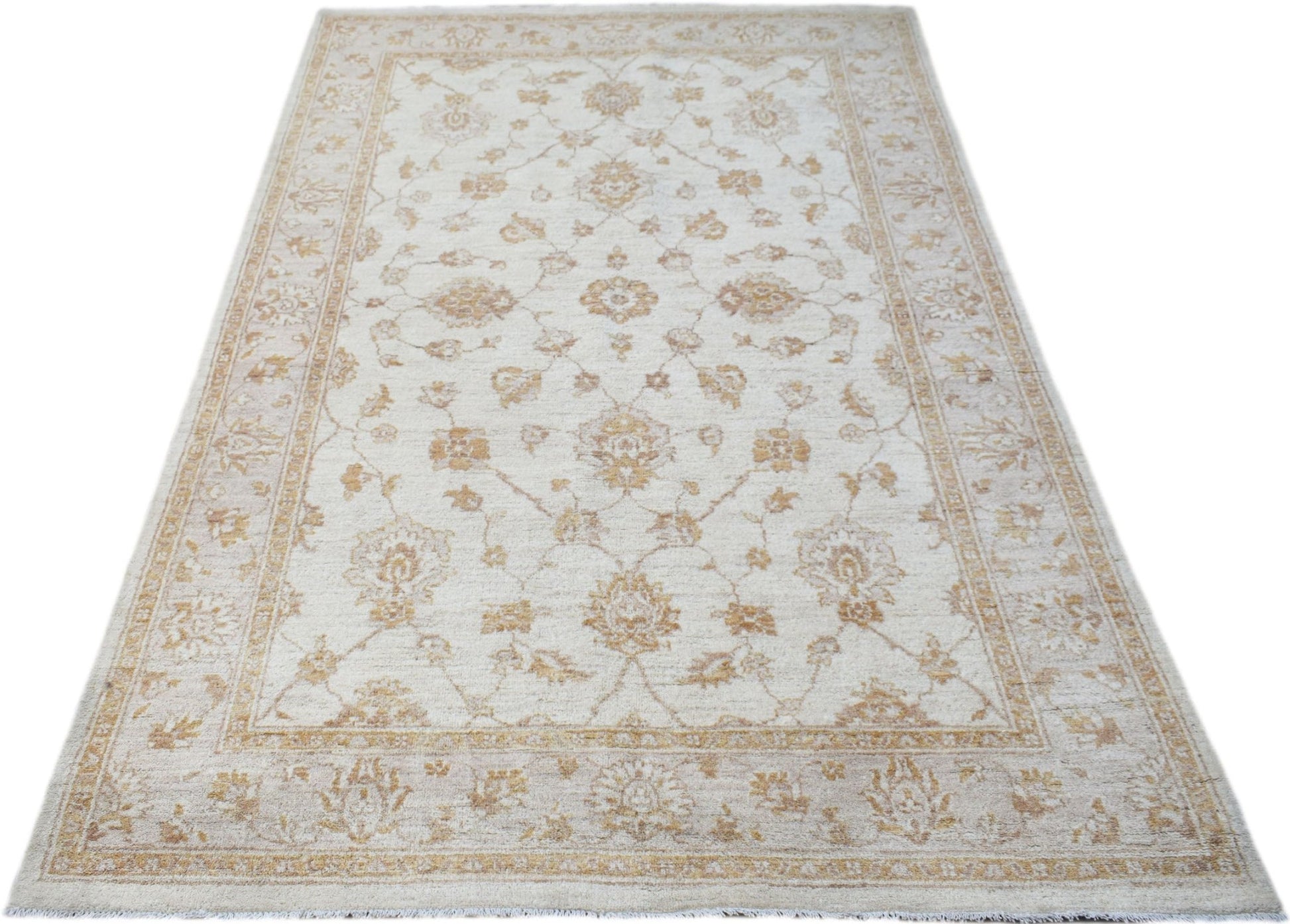 An Afghan Chobi rug featuring a traditional floral pattern in soft beige and golden wood tones.