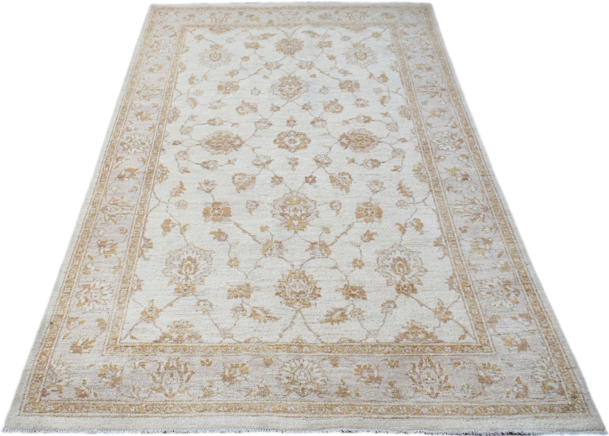 An Afghan Chobi rug featuring a traditional floral pattern in soft beige and golden wood tones.