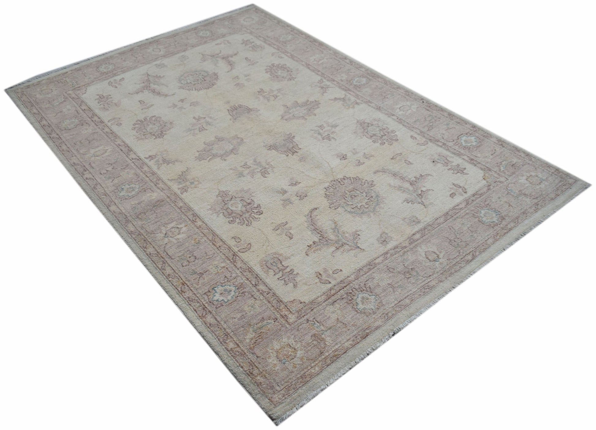A rectangular Afghan Chobi rug featuring traditional floral patterns in soft beige and brown tones.