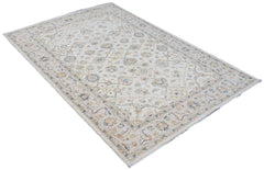A rectangular Afghan Chobi rug featuring a traditional floral pattern in soft beige and blue tones.