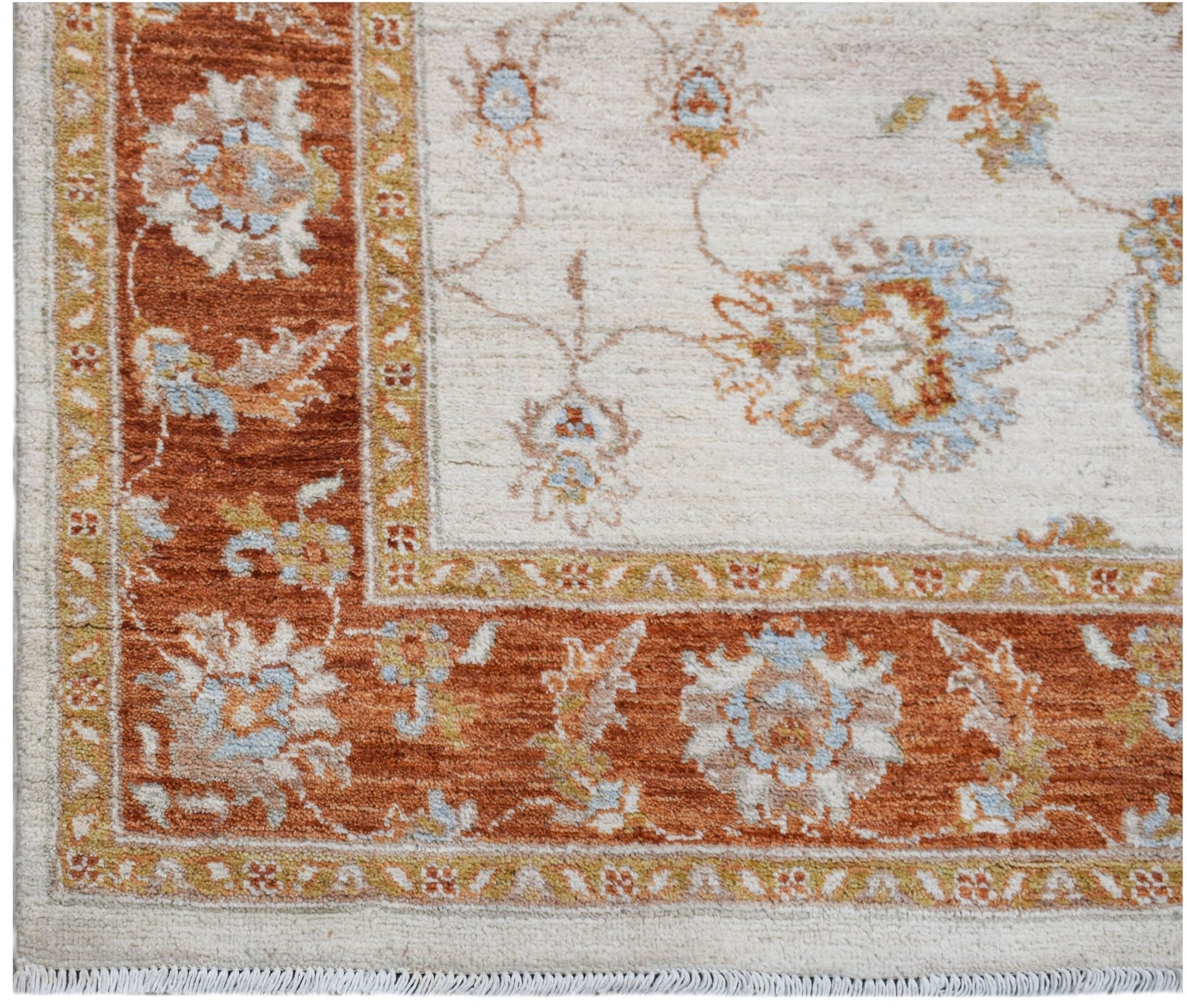 An Afghan Chobi rug featuring a rust-colored floral border on a cream background.